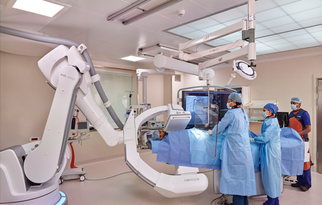 Robotic Hybrid Cath Lab with a Multi-Axis C Arm