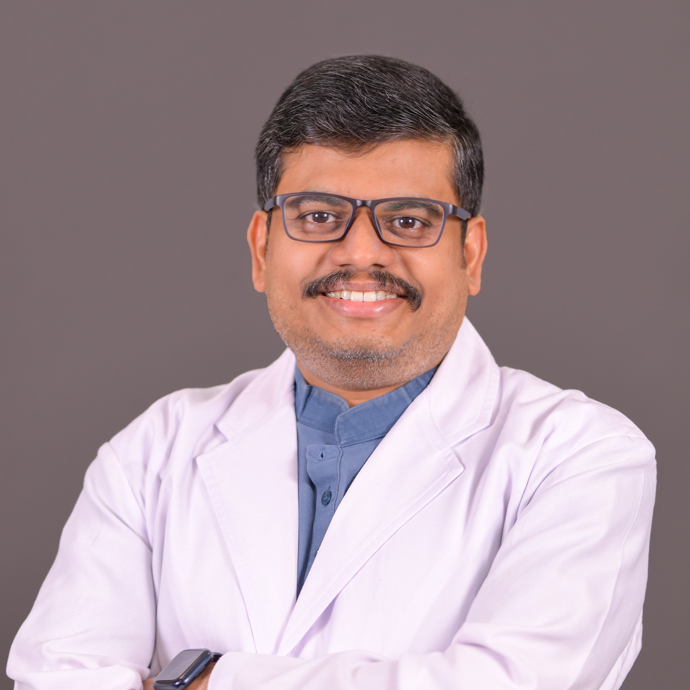 Dr. Kiran S